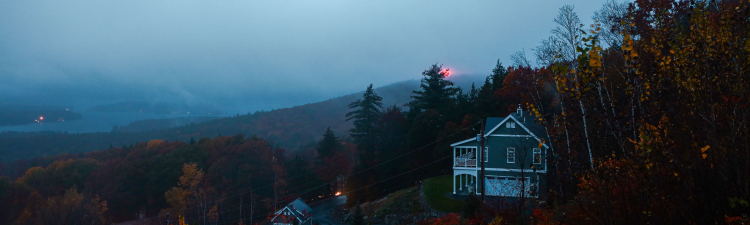 House in the woods at dusk