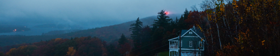 House in the woods at dusk