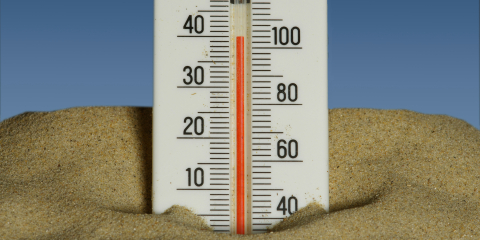 ""thermometer in sand