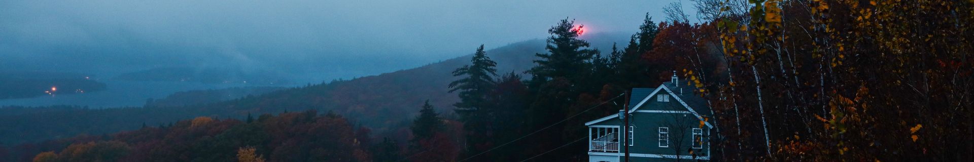 House in the woods at dusk